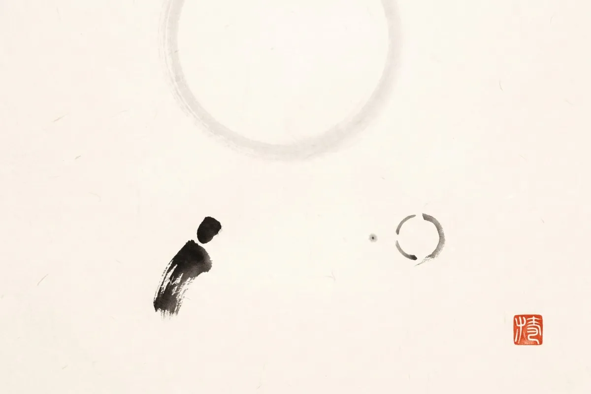 An ink-brush figure faces a small open circle beneath a large pale ring, with a red seal at lower right.