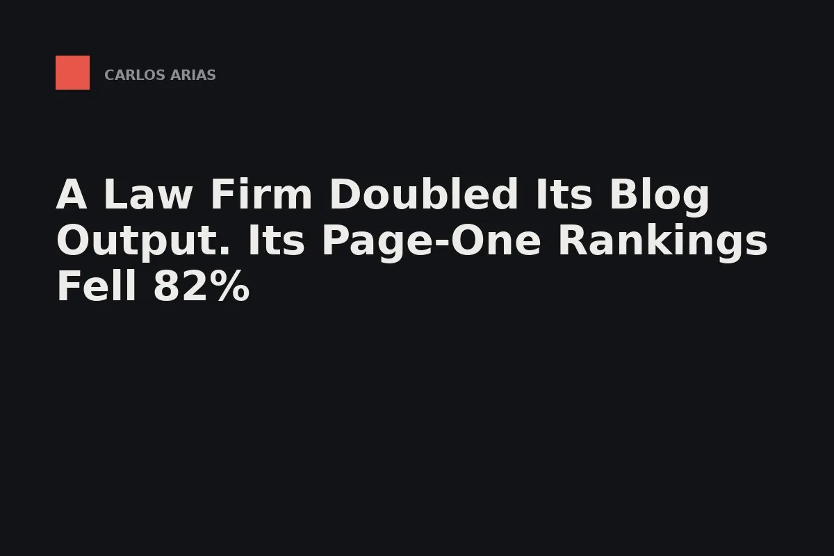 A tall stack of identical printed pages beside one inked page on a desk in afternoon light.